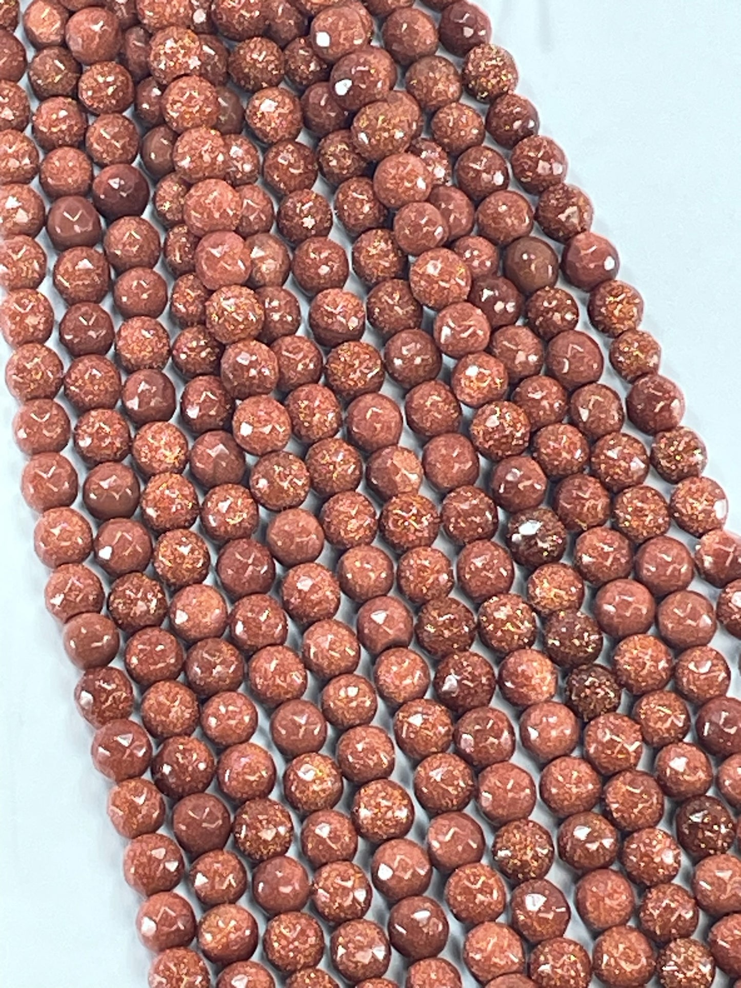 Goldstone Faceted Round, 6mm, 16" Strand