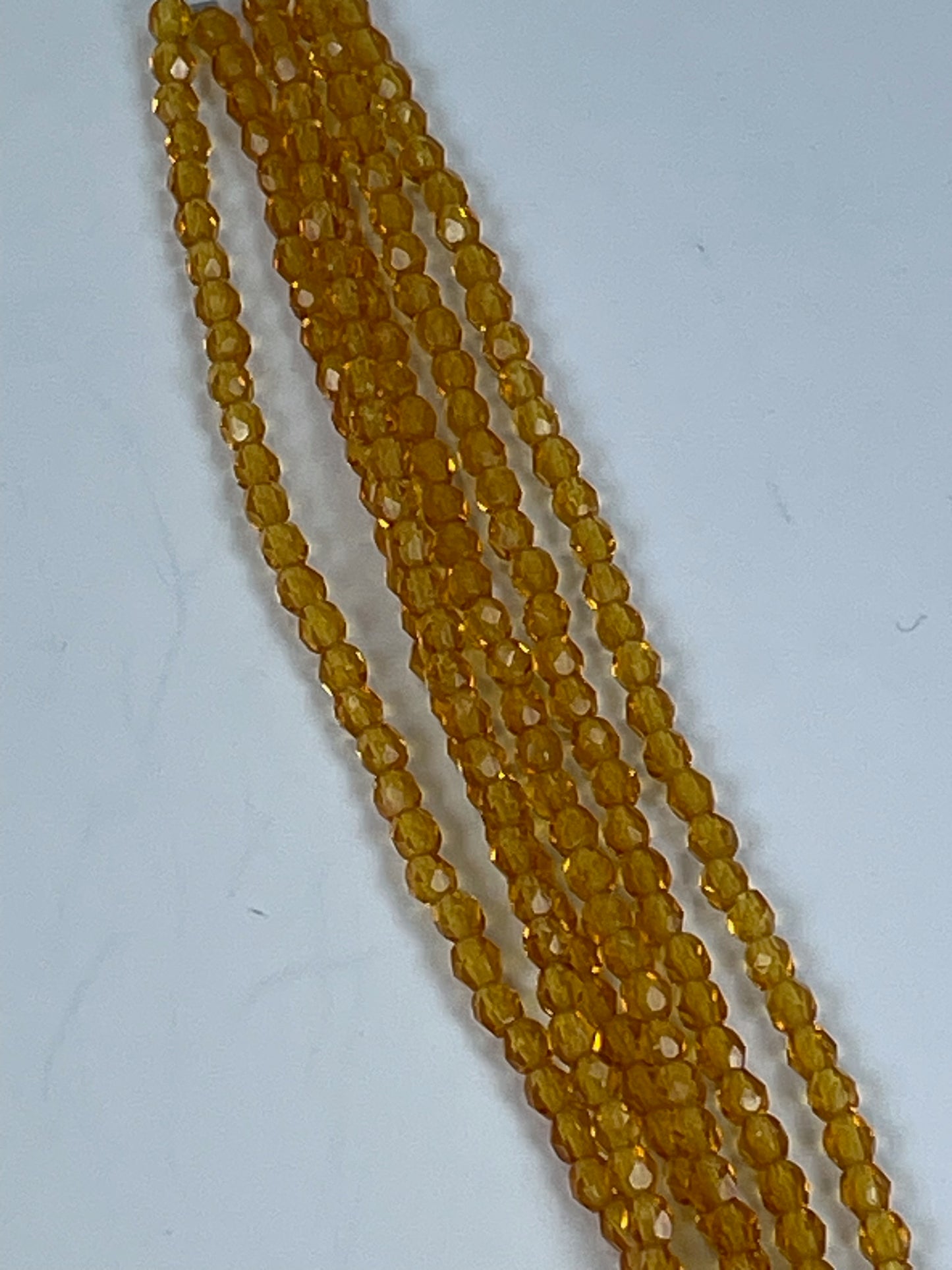 Czech FP Dk Amber 4mm 6" Strand