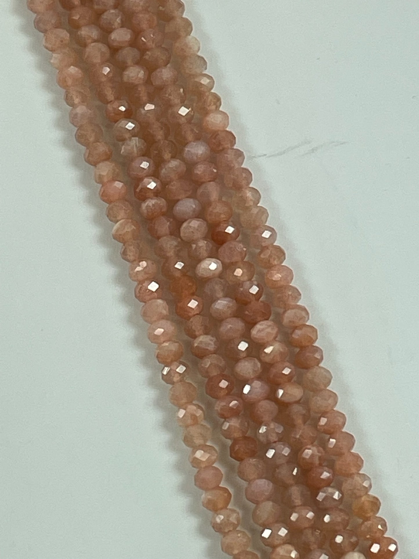 Sunstone Faceted Rondelles, 3x4mm, 16" Strand