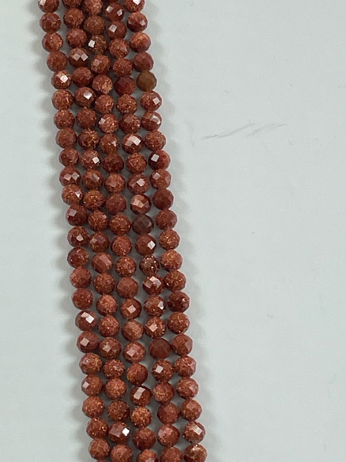 Goldstone Faceted, 4mm, 16" Strand