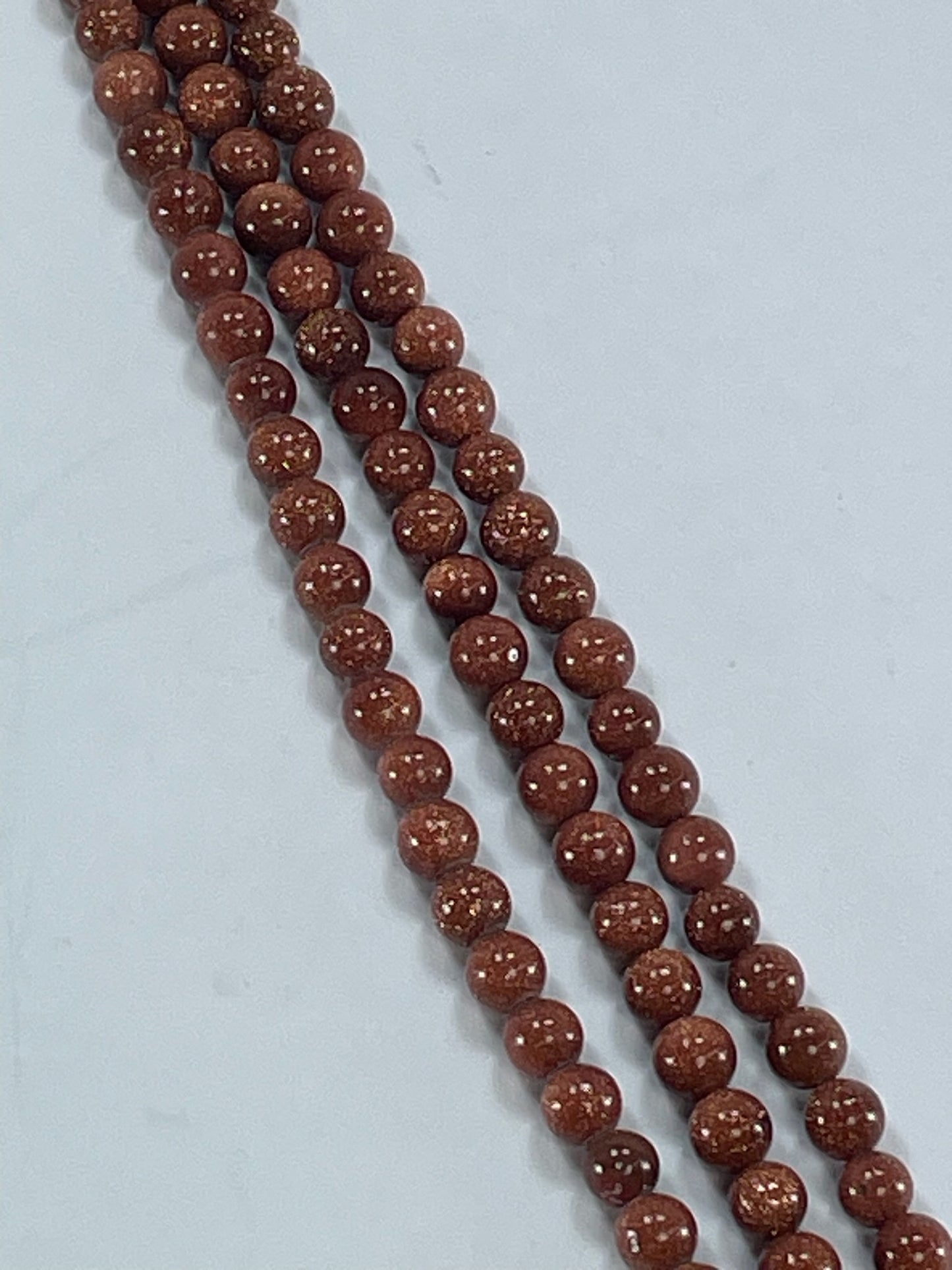 Goldstone Round, 6mm, 16" Strand